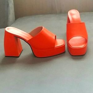 Chunky platform  asymmetric like heels